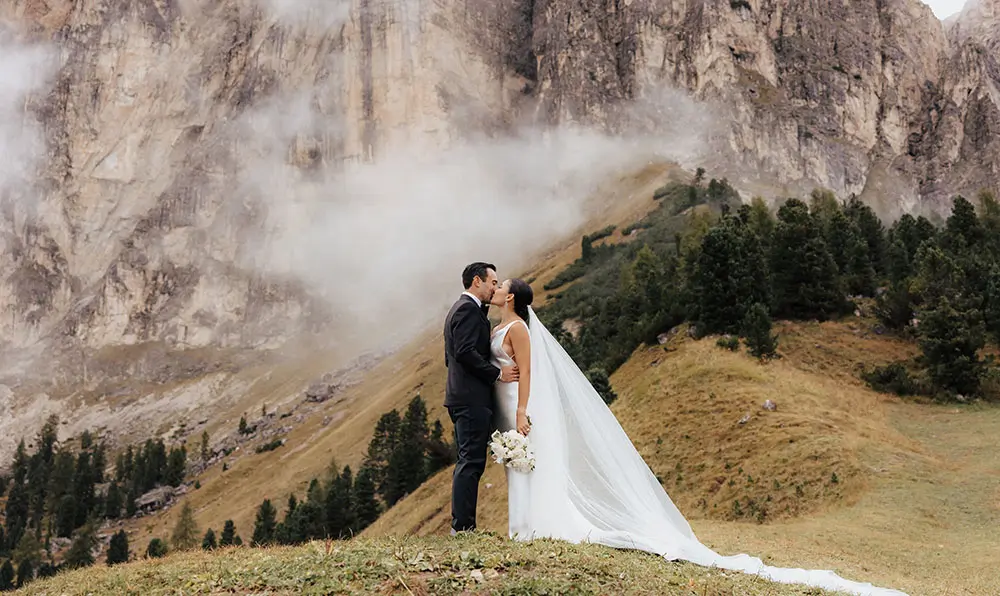 Rainy autumn wedding in the Dolomites